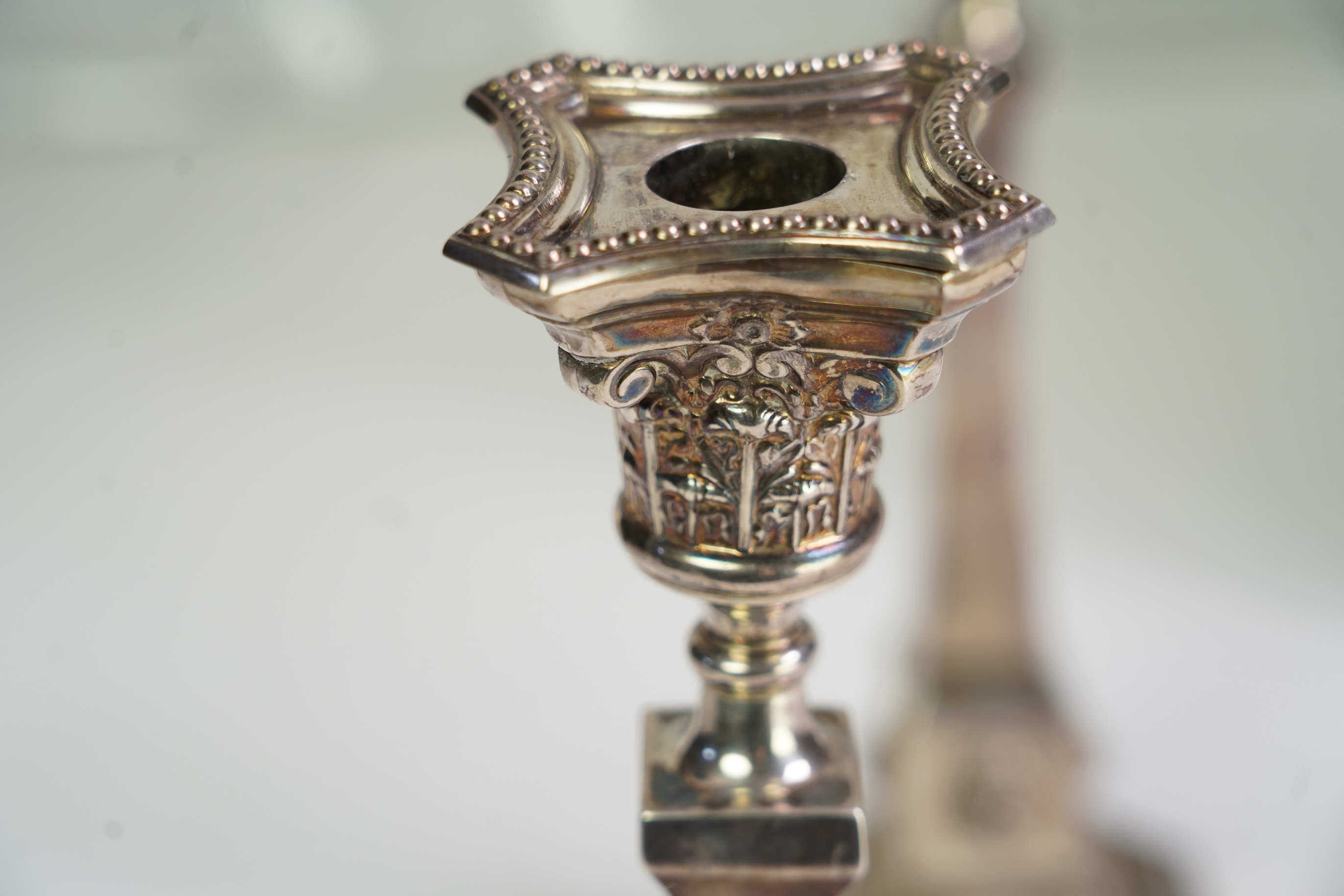 A pair of George V silver candlesticks, maker N.S.